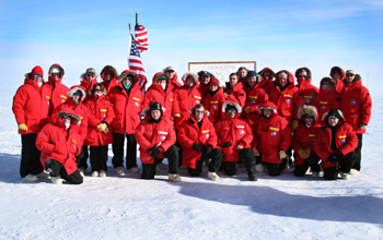 A congressional delegation poses at the South Pole